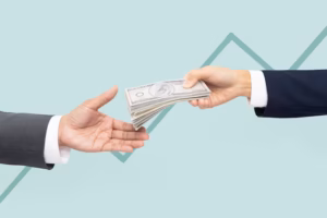 Cash payment representing slow insurance payouts for Florida restoration contractors